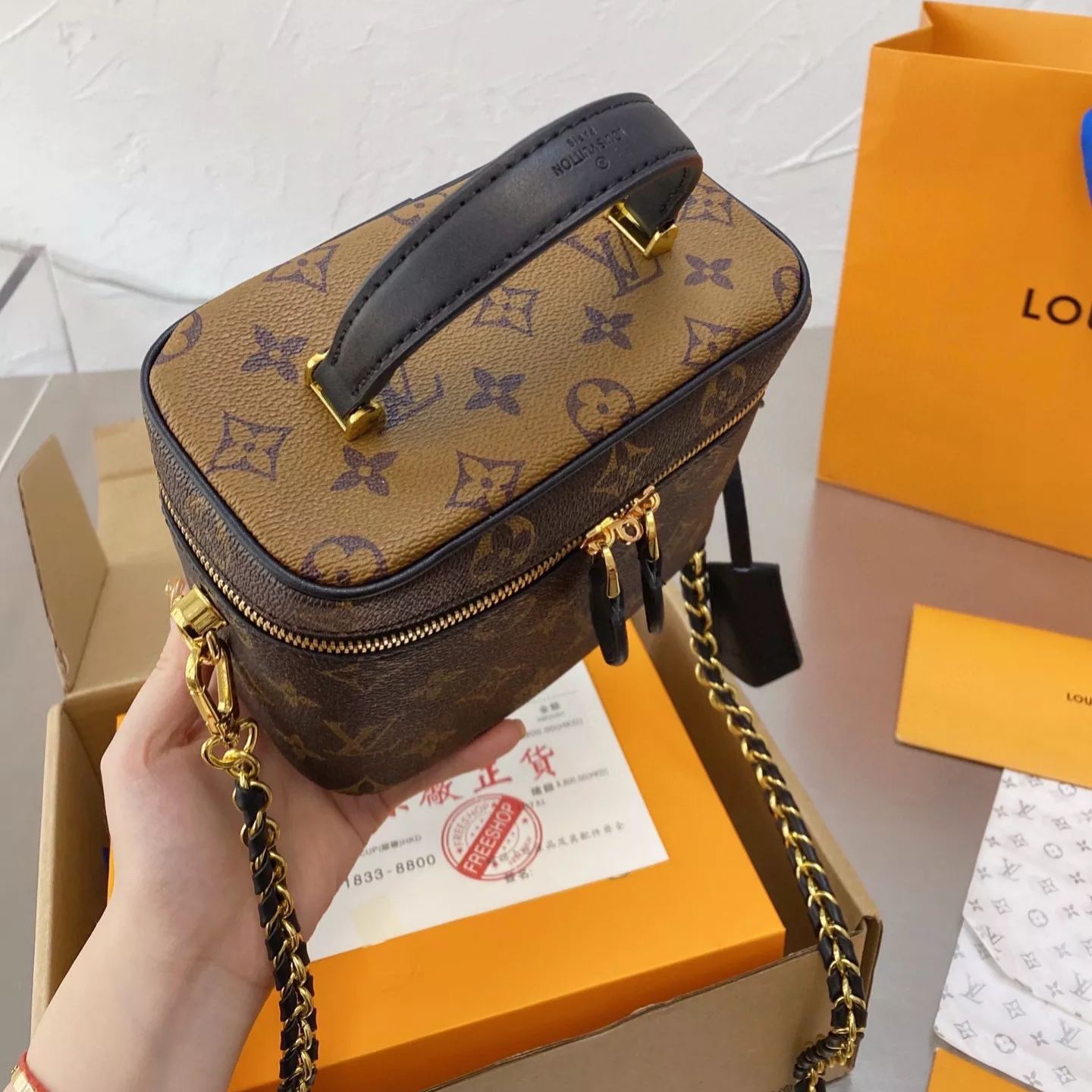 Borsa classica con catena marrone
