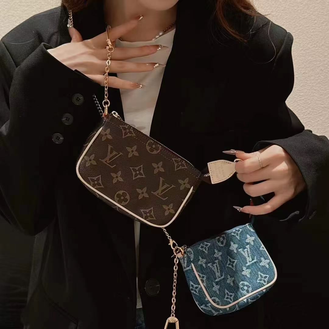 Borsa con catene modello jeans classico