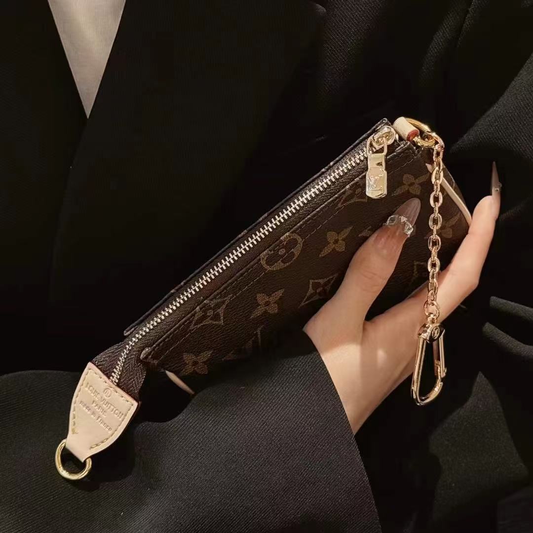 Borsa con catene modello jeans classico