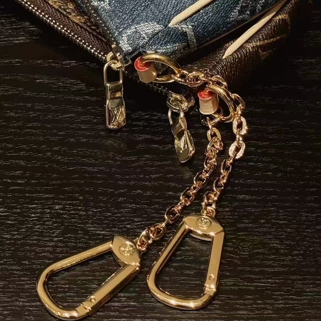 Borsa con catene modello jeans classico