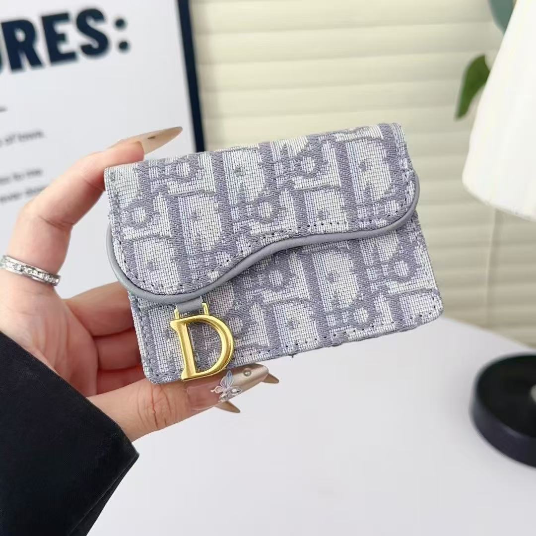Borsa portafoglio con tracolla a livelli di ricamo