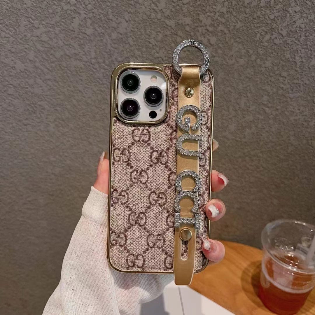Custodia per telefono con strass dorati per iPhone