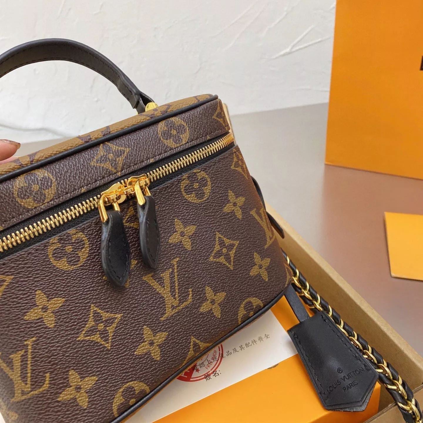 Borsa classica con catena marrone