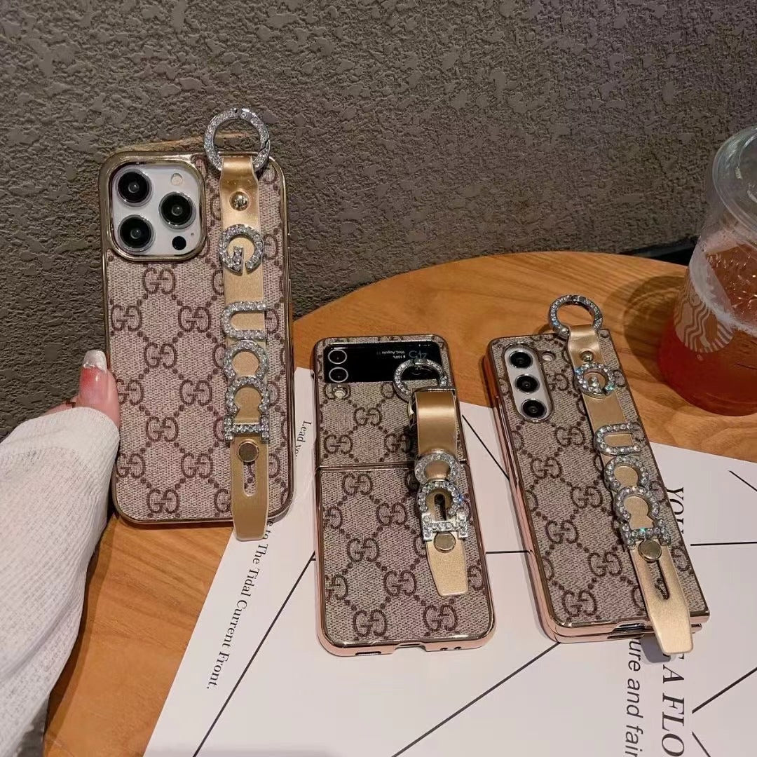 Custodia per telefono con strass dorati per iPhone