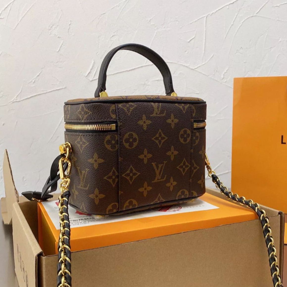 Borsa classica con catena marrone