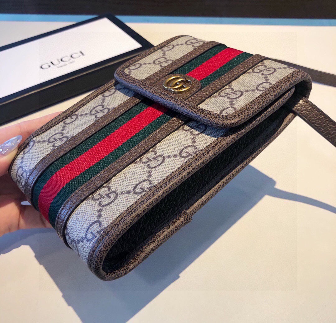 Borsa per telefono marrone a righe