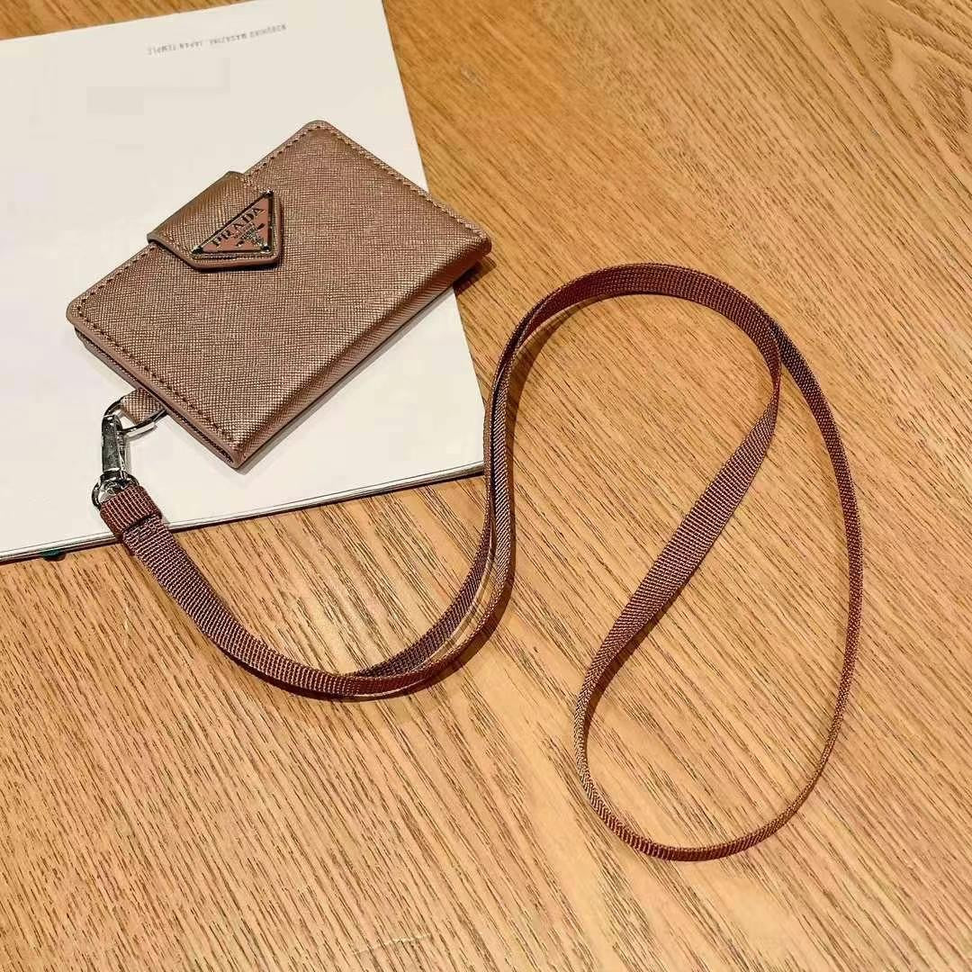 Portafoglio porta monete portatile con cinturino elegante