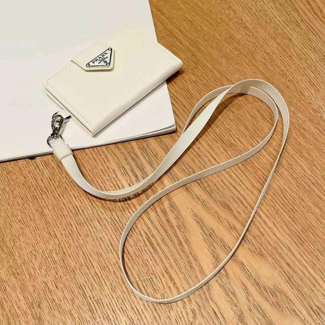 Portafoglio porta monete portatile con cinturino elegante