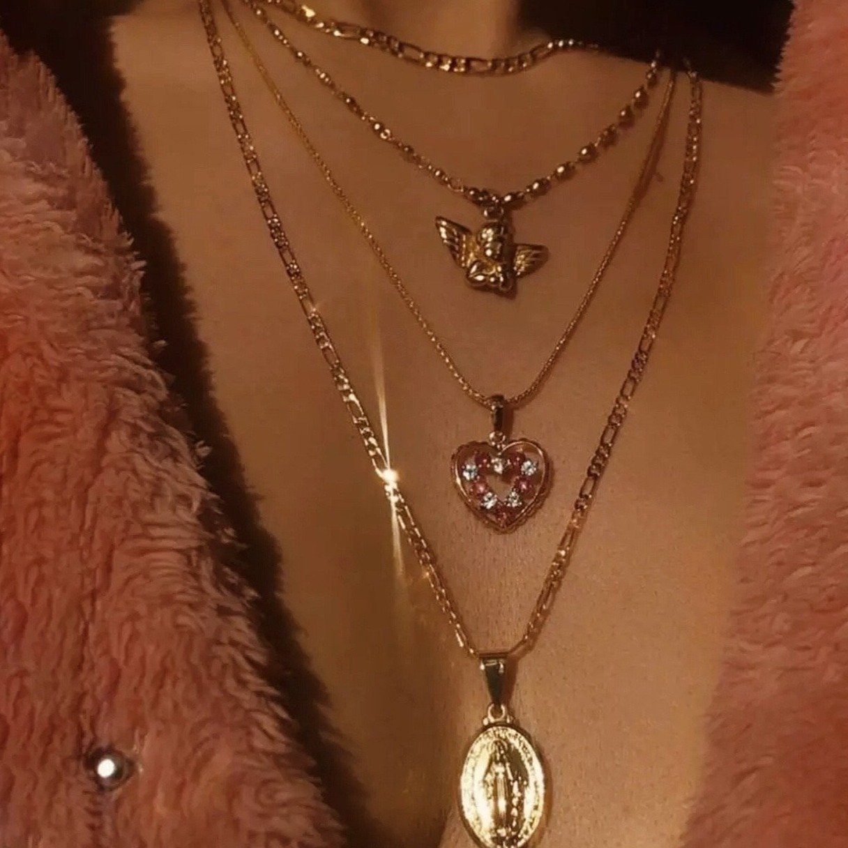 Collana vintage con cherubino e cuore di cristallo