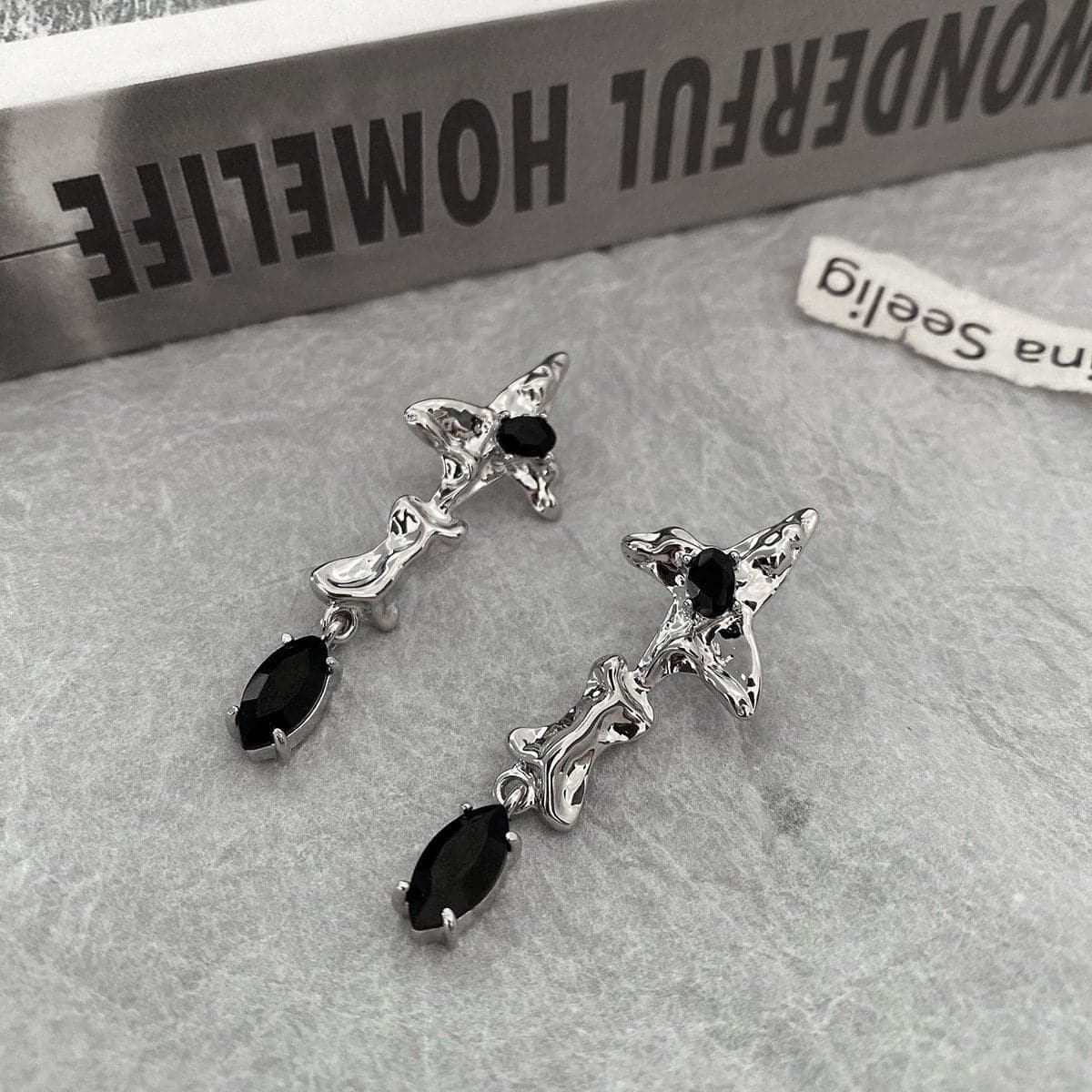 orecchini in argento con ciondolo in pietra lavica