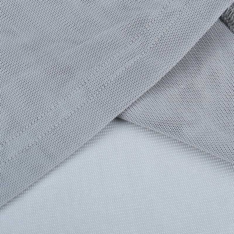 Haut en maille transparente à manches longues et fente froncée avec perles