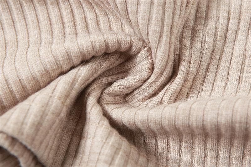 Top corto in due pezzi con scollo a giro e spalle scoperte a contrasto
