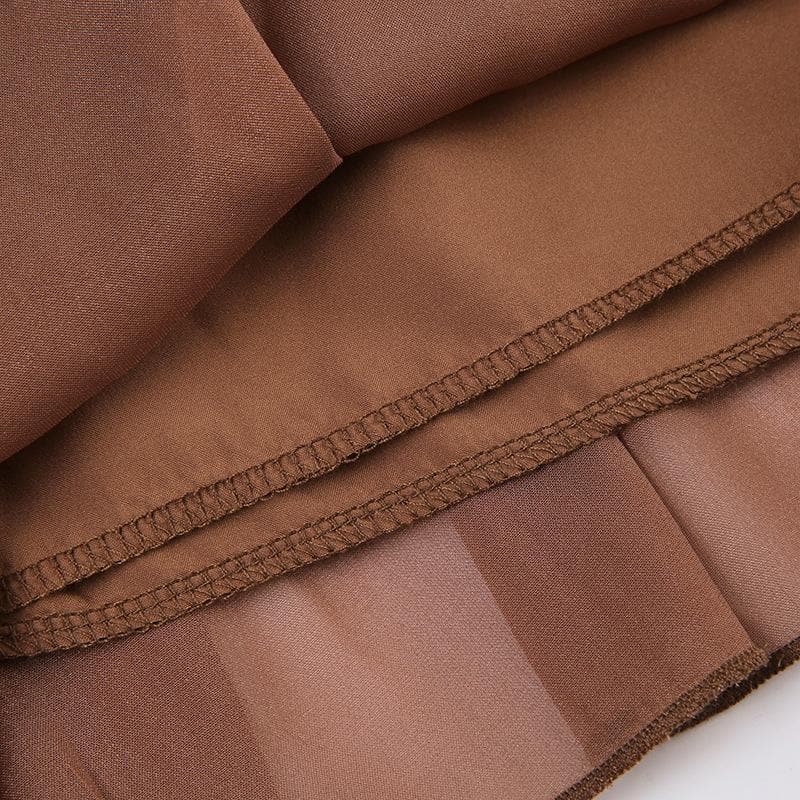 Minigonna a vita bassa in chiffon con arricciatura, cerniera e fiocco