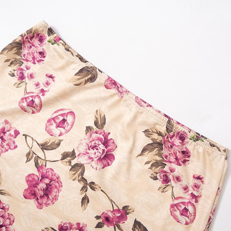 Completo gonna lunga con spacco sul retro, corsetto a contrasto e stampa floreale