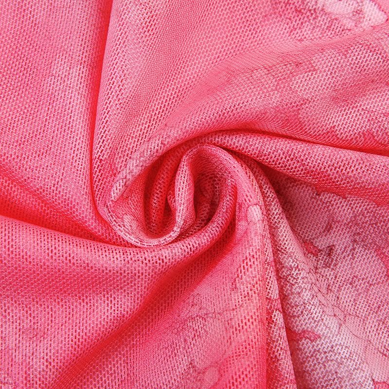 Top corto con volant e stampa floreale in rete trasparente con scollo a V