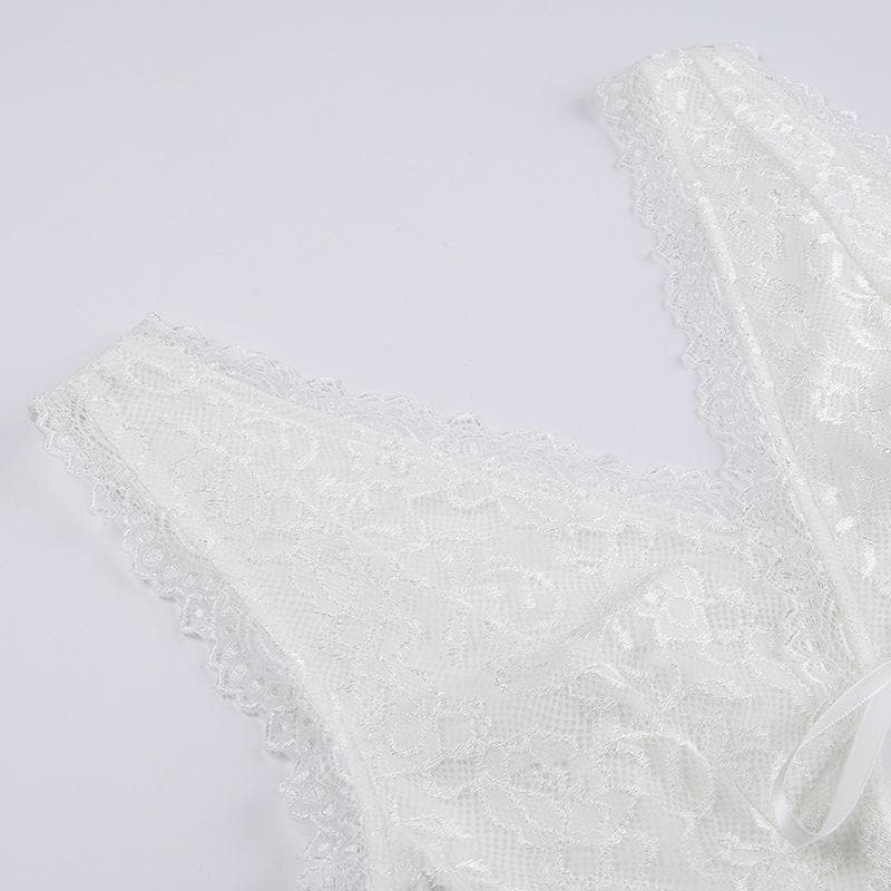 Top senza maniche con laccetti e scollo a V in patchwork di pizzo