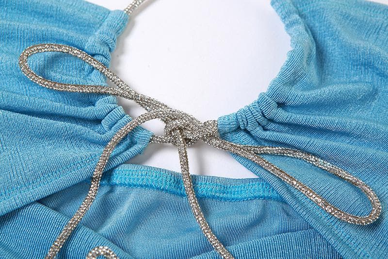 Minigonna con incrocio sul davanti, arricciata, senza schienale e con scollo all'americana