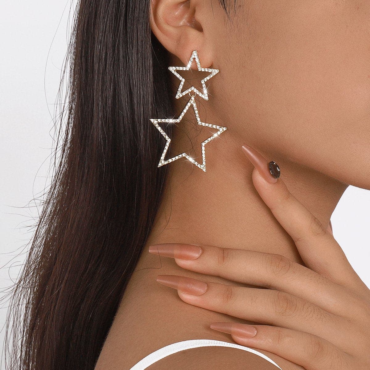 Orecchini con ciondolo a stella e strass
