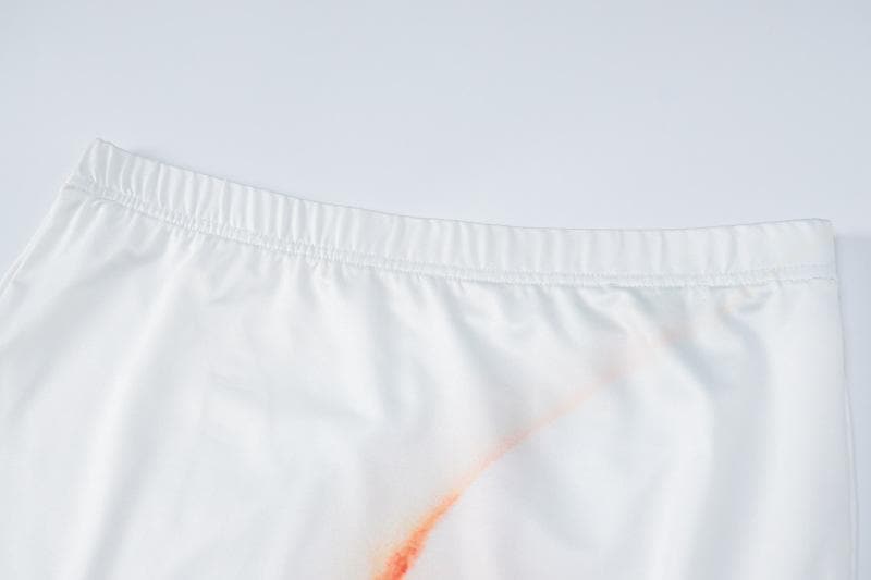 Completo gonna lunga senza maniche con scollo a giro e stampa labbra a contrasto
