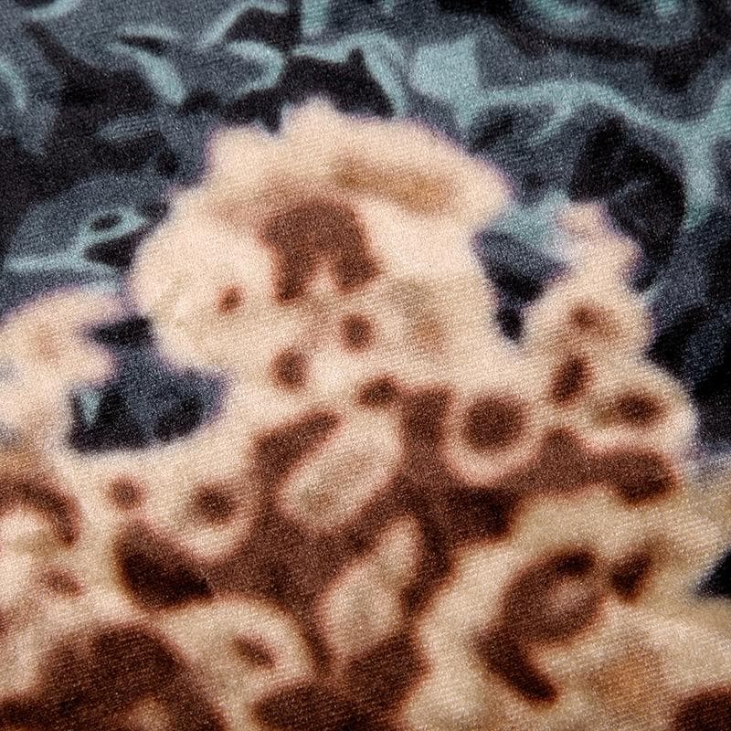 Gonna lunga a vita bassa irregolare con arricciature a contrasto in velluto con stampa floreale