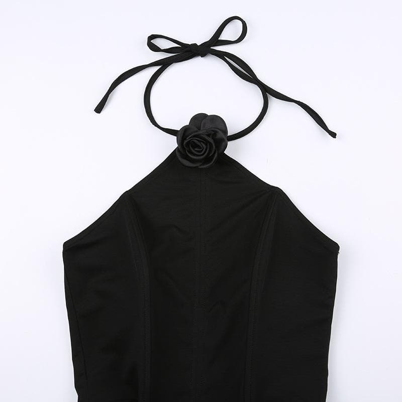 Top corsetto con schiena scoperta e allacciatura a collo alto con applicazioni floreali