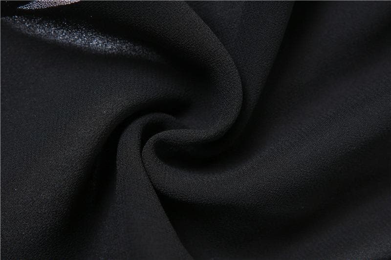 Top corto in chiffon con volant, arricciatura, schiena scoperta e bottoni