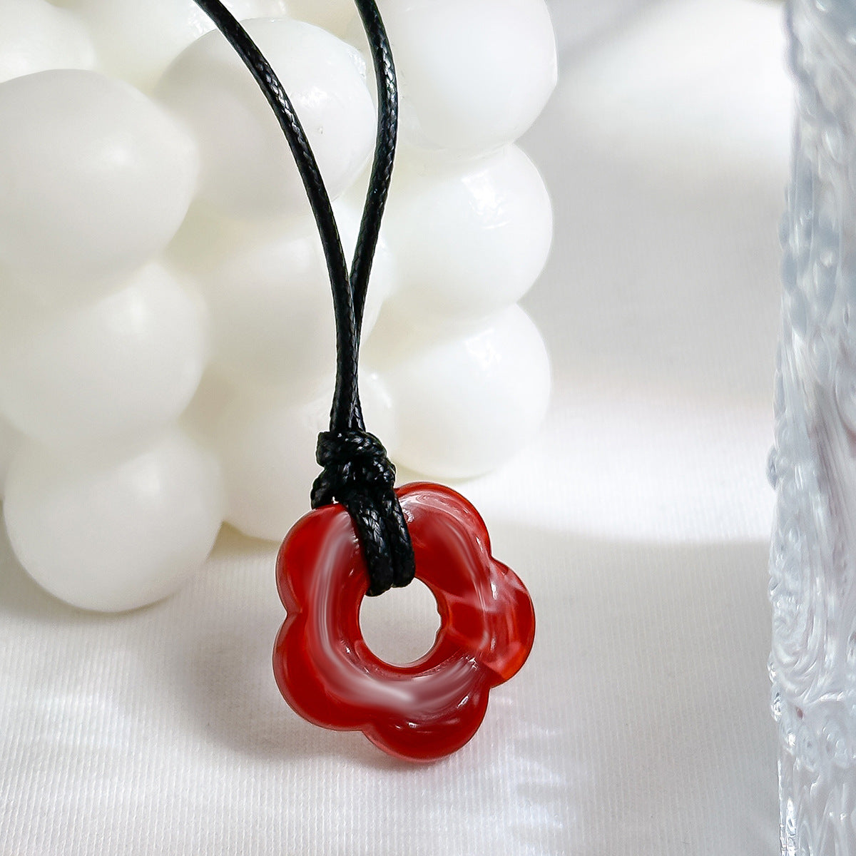 Collana con ciondolo a forma di fiore