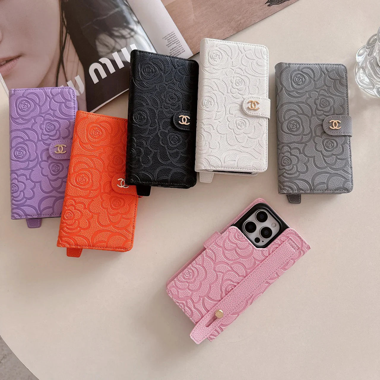 Custodia per telefono con cinturino da polso Camellia per iPhone