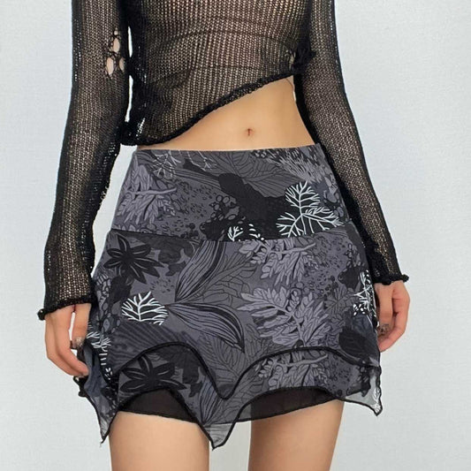 Minigonna in chiffon con stampa di foglie irregolari a contrasto e cerniera 