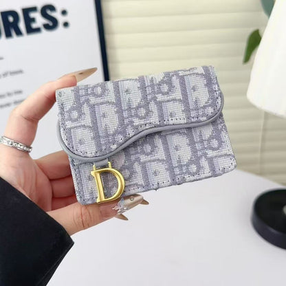 Borsa portafoglio con tracolla a livelli di ricamo