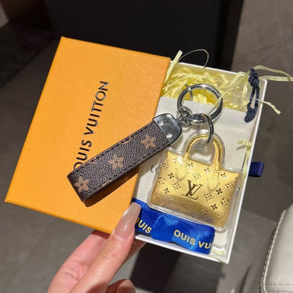 Mini portachiavi con borsa dorata