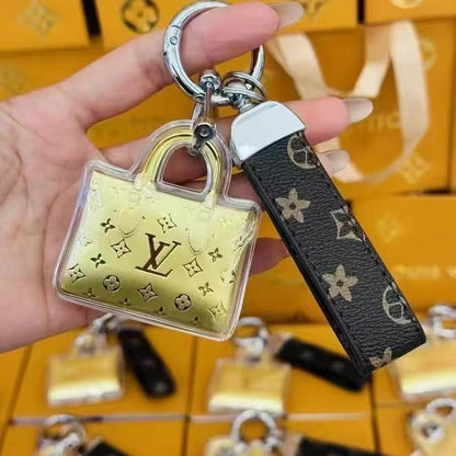 Mini portachiavi con borsa dorata