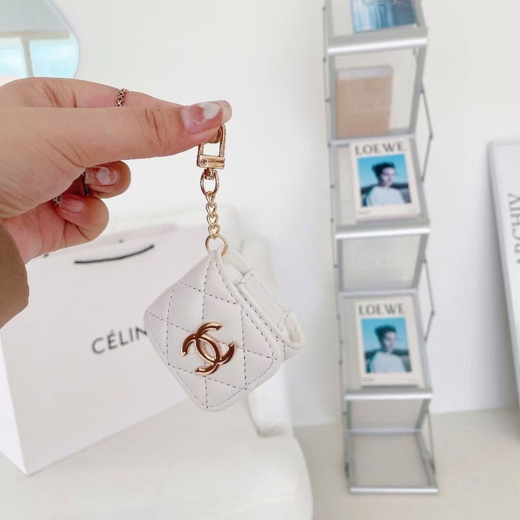 Custodia per AirPods con motivo a reticolo