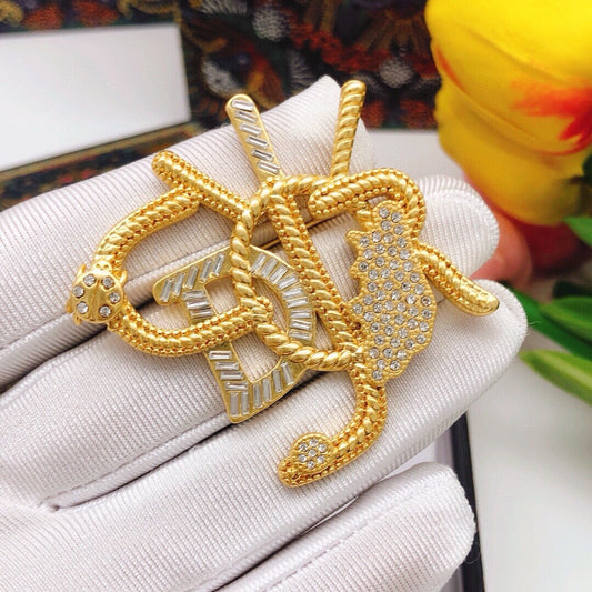Spilla vintage in oro metallizzato