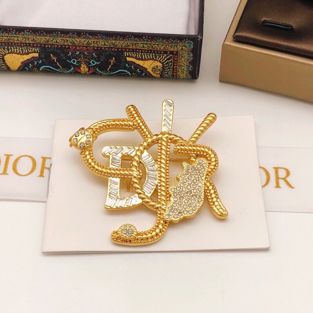 Spilla vintage in oro metallizzato