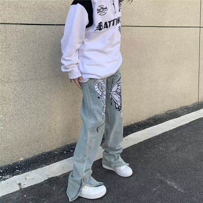 Jeans a gamba larga sbiaditi a vita bassa