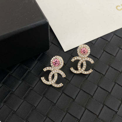Orecchini con strass rosa