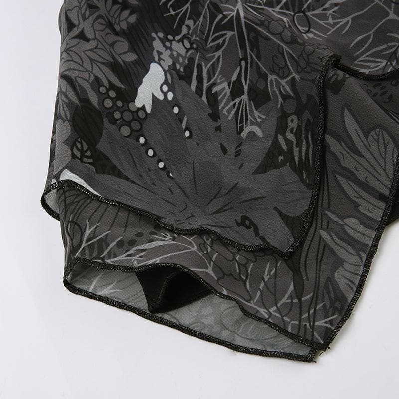 Minigonna in chiffon con stampa di foglie irregolari a contrasto e cerniera 