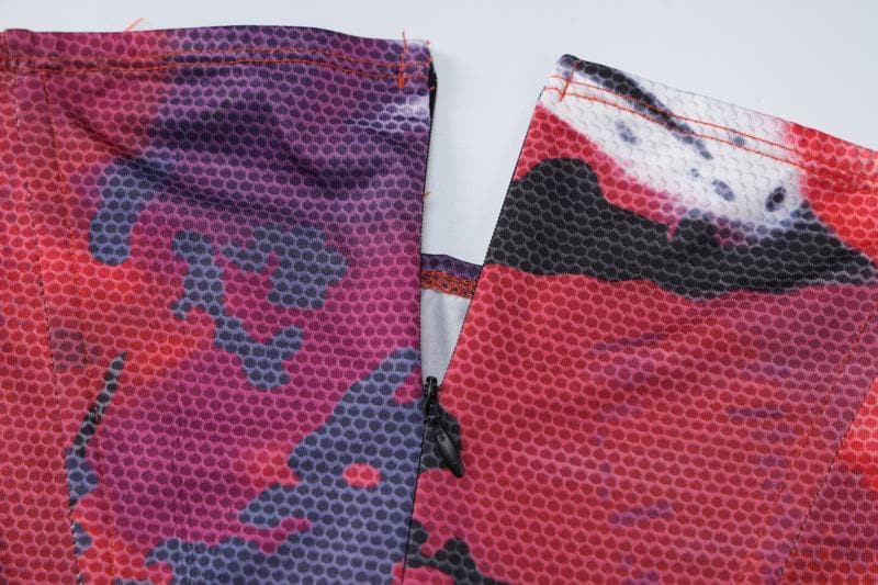 Minigonna a vita bassa con corsetto senza schienale e cerniera a contrasto 