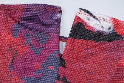 Minigonna a vita bassa con corsetto senza schienale e cerniera a contrasto 