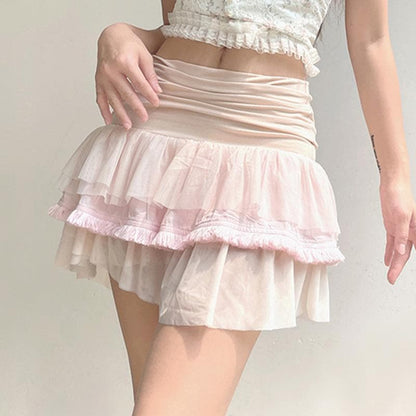 Minigonna in rete patchwork con volant arricciati a contrasto 