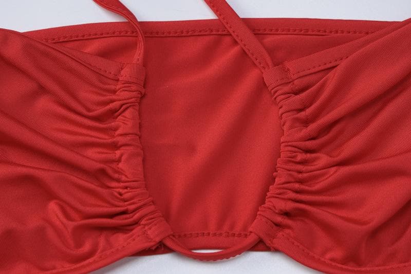Gonna lunga con spacco annodato, applicazione floreale e incrocio sul davanti 