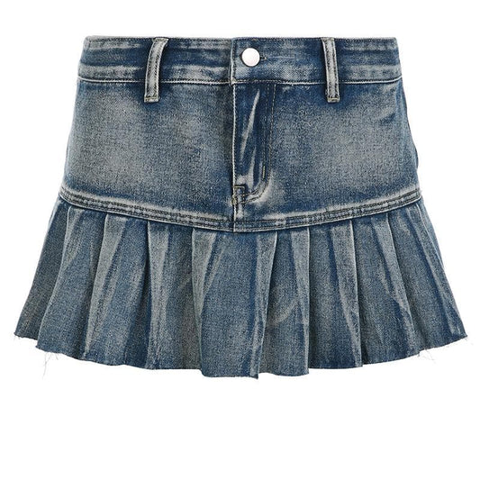 Minigonna in denim a trapezio con orlo grezzo e vita bassa plissettata 