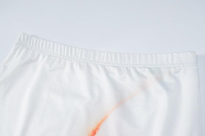 Completo gonna lunga senza maniche con scollo a giro e stampa labbra a contrasto 