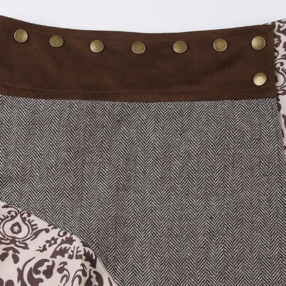 Minigonna a trapezio con cerniera a contrasto e bottoni patchwork 