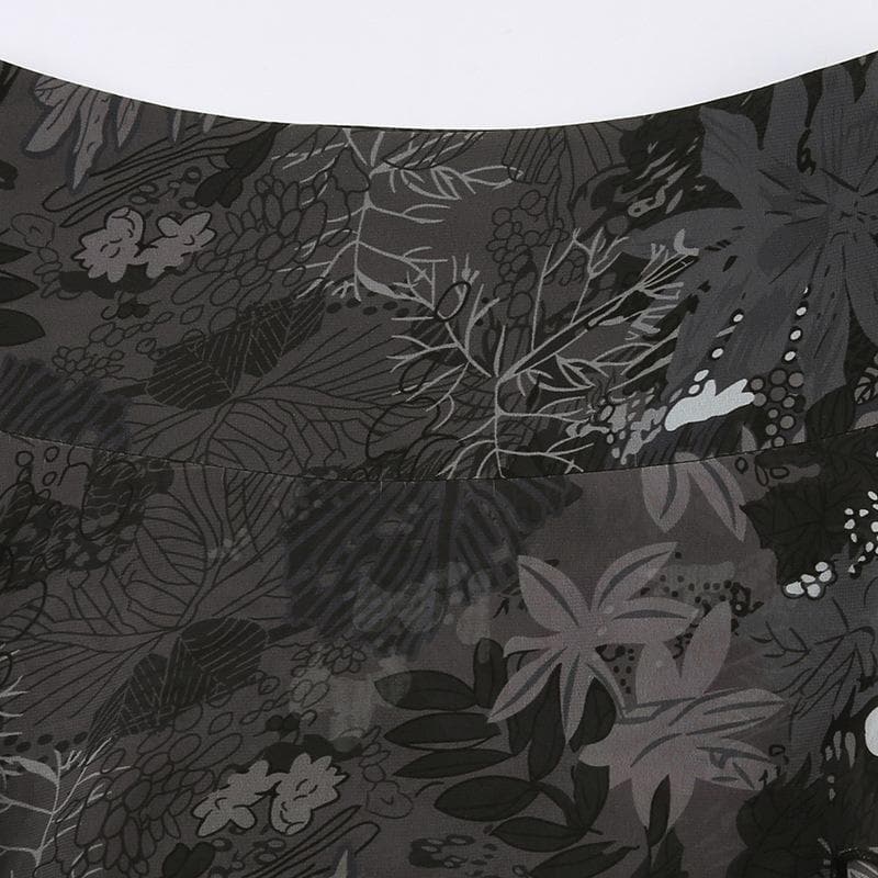 Minigonna in chiffon con stampa di foglie irregolari a contrasto e cerniera 