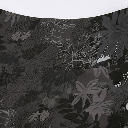 Minigonna in chiffon con stampa di foglie irregolari a contrasto e cerniera 